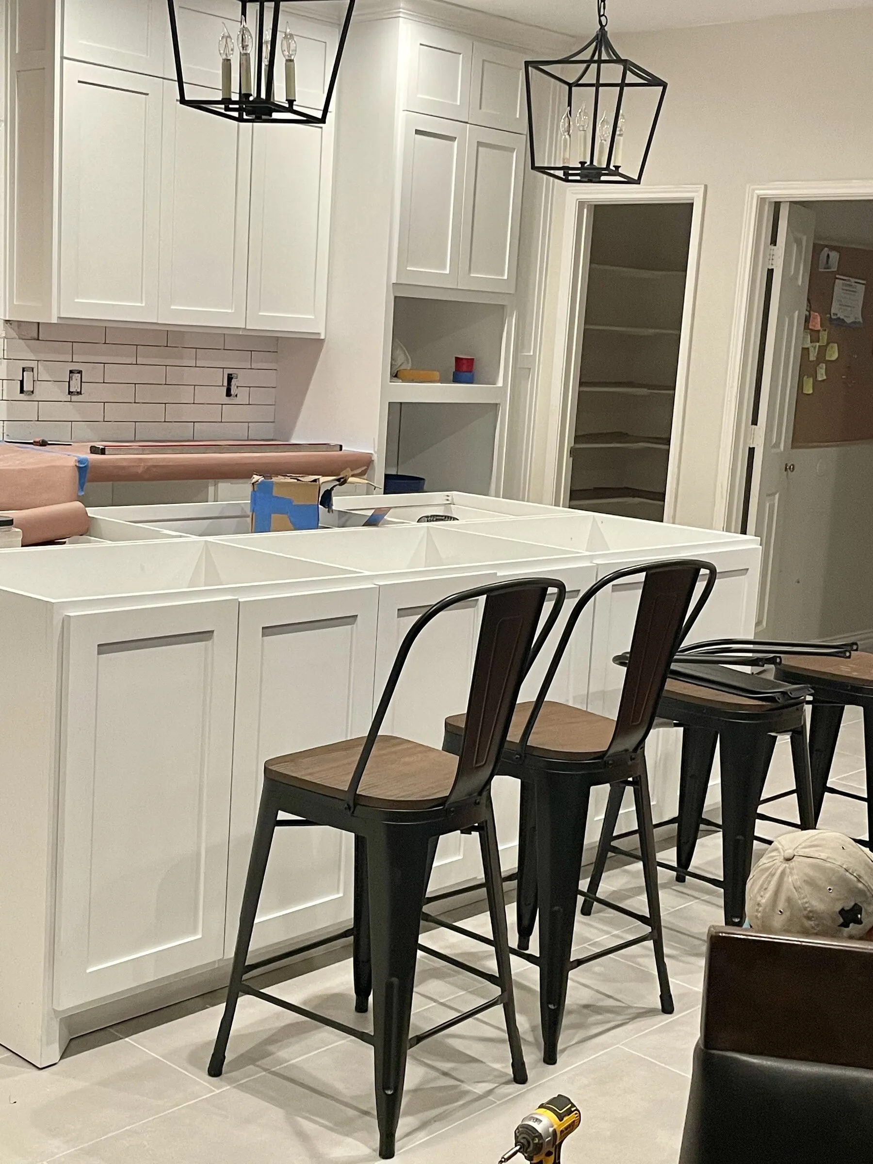 Kitchen island with bar stools by IonBuilds