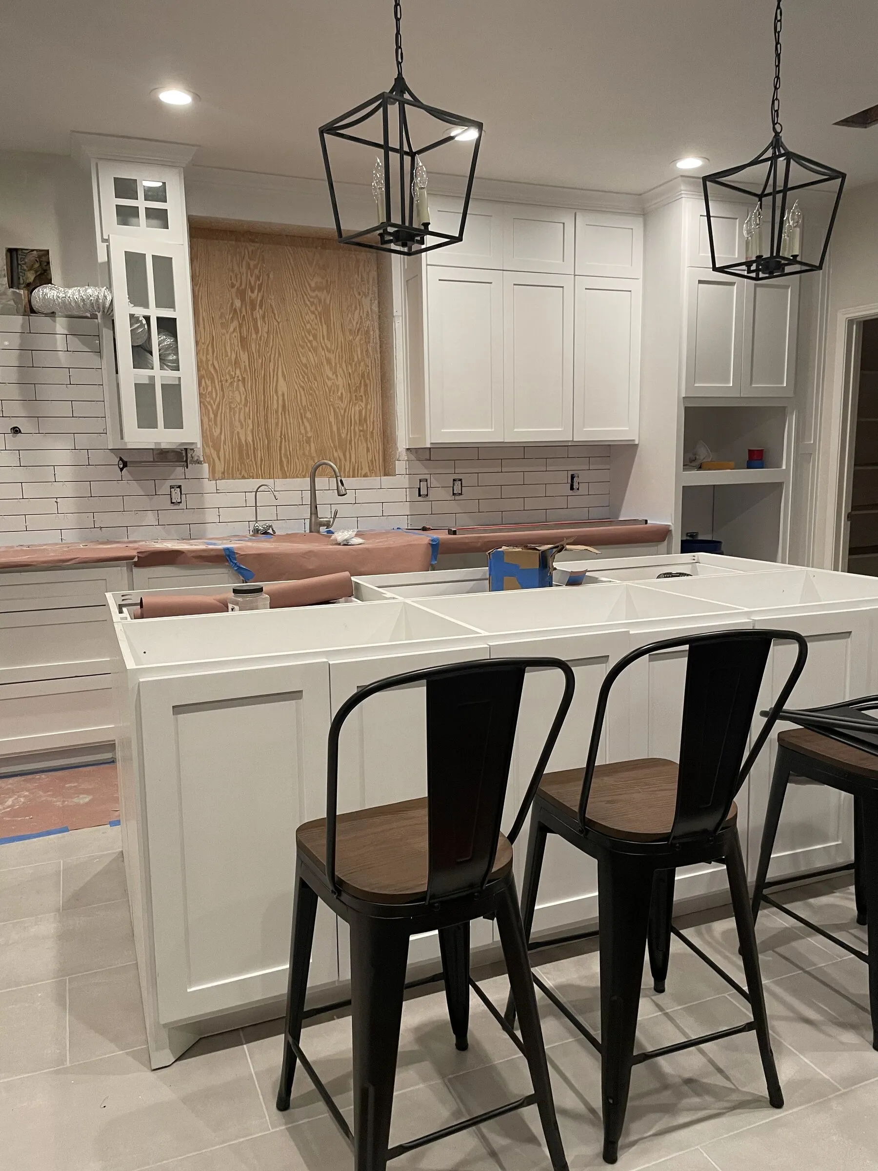 Kitchen island with subway tile backsplash by IonBuilds