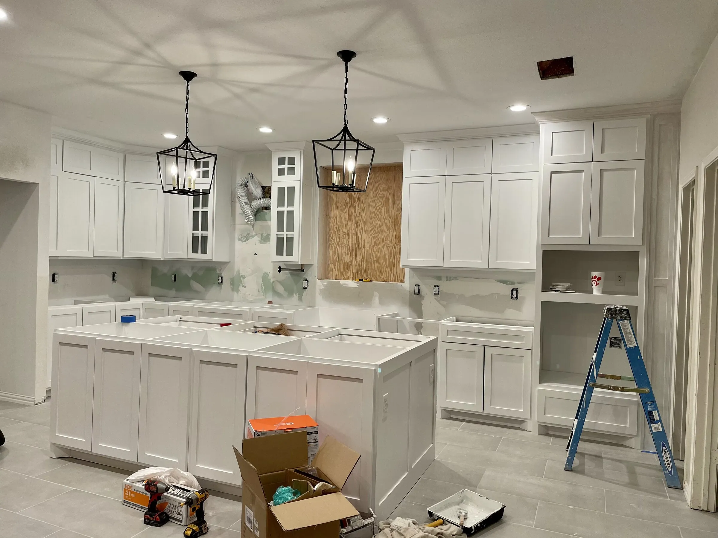 White shaker kitchen with island by IonBuilds