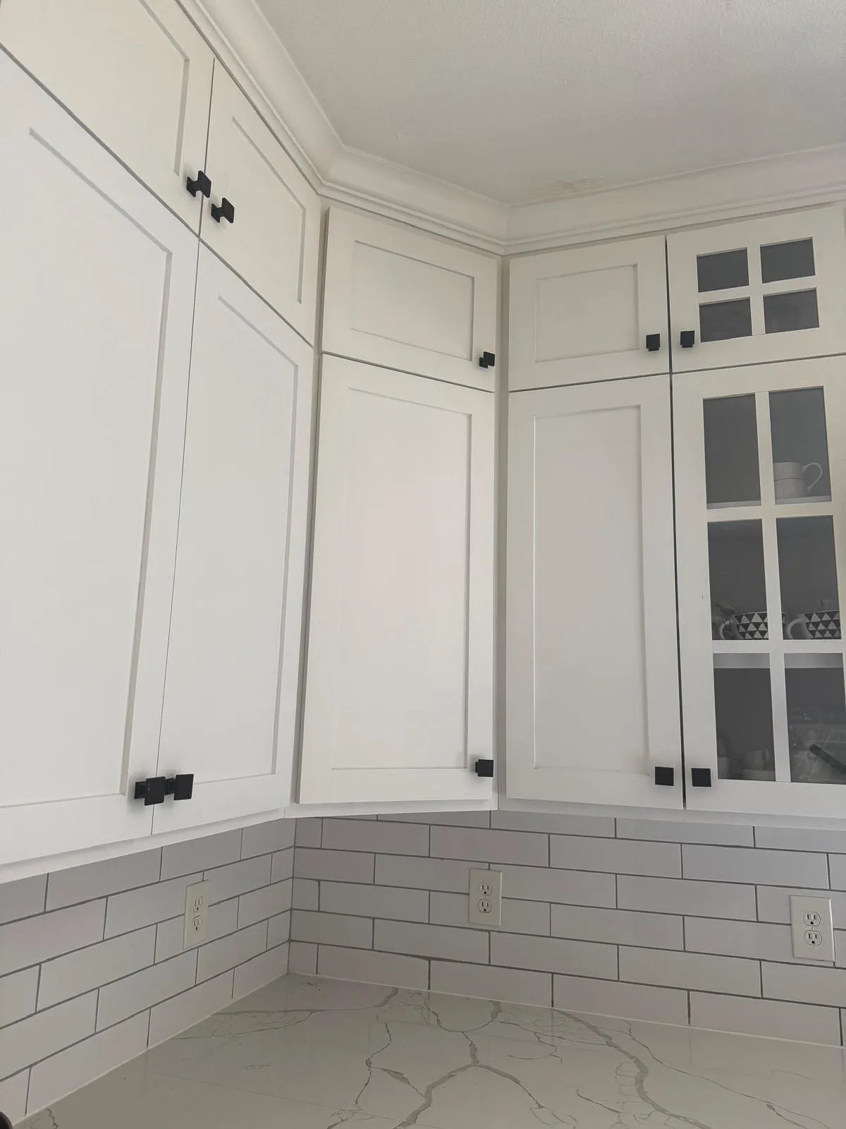 Floor-to-ceiling custom kitchen cabinets by IonBuilds