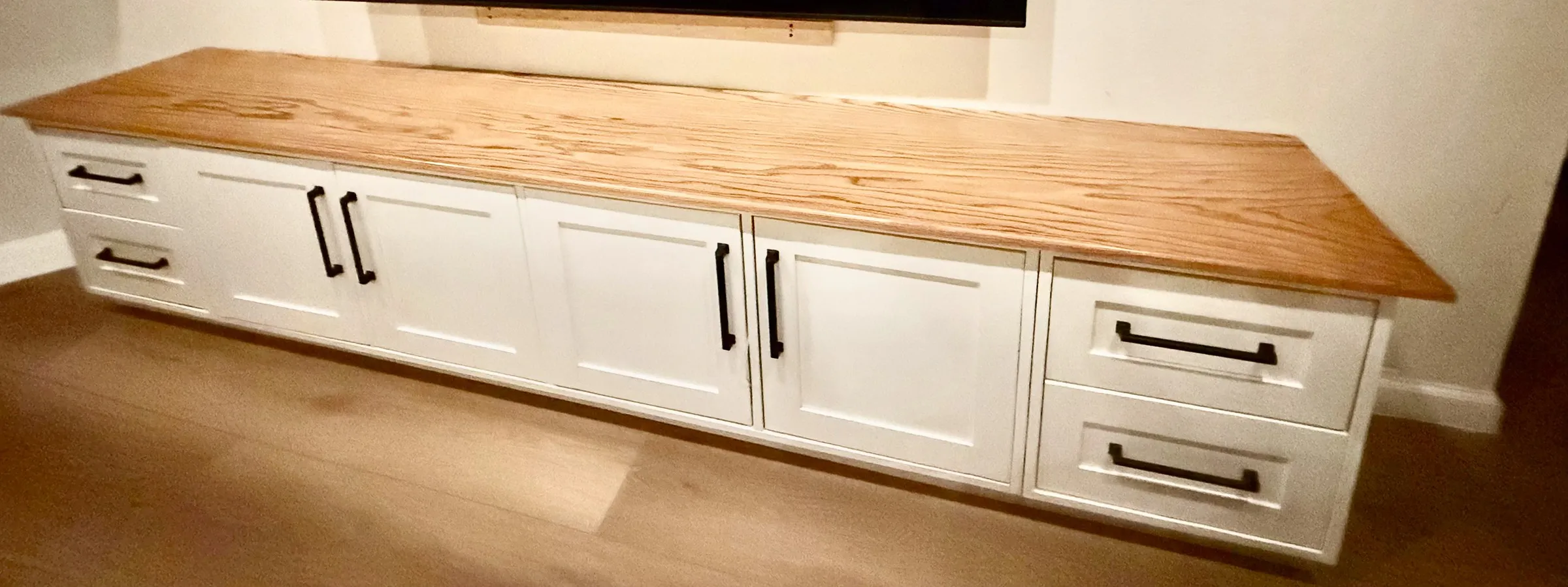 Custom built-in media center with display shelving by IonBuilds Plano TX