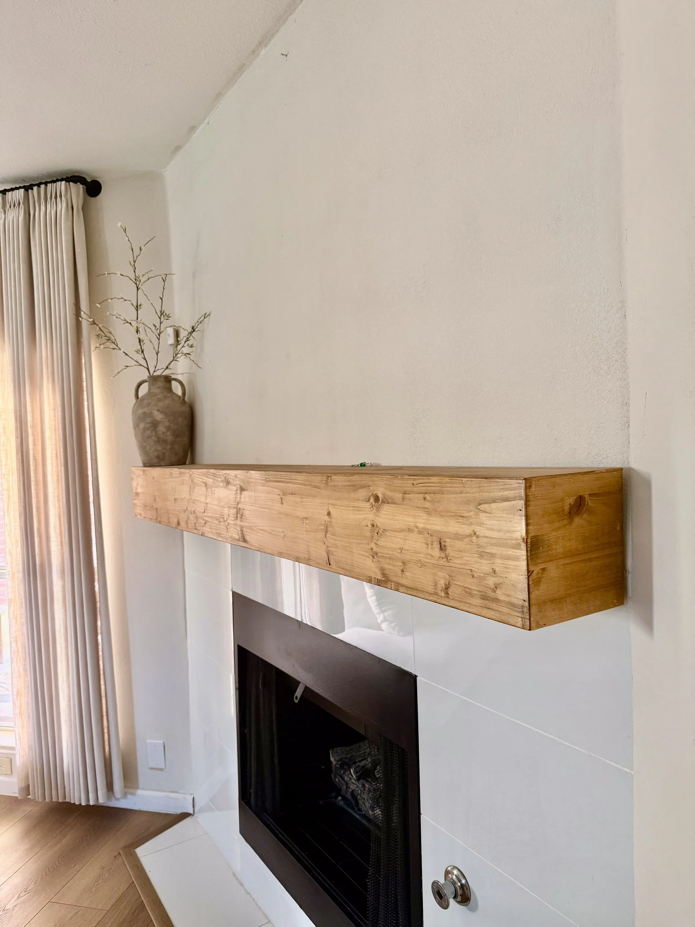 Custom solid wood fireplace beam mantel by IonBuilds Plano TX
