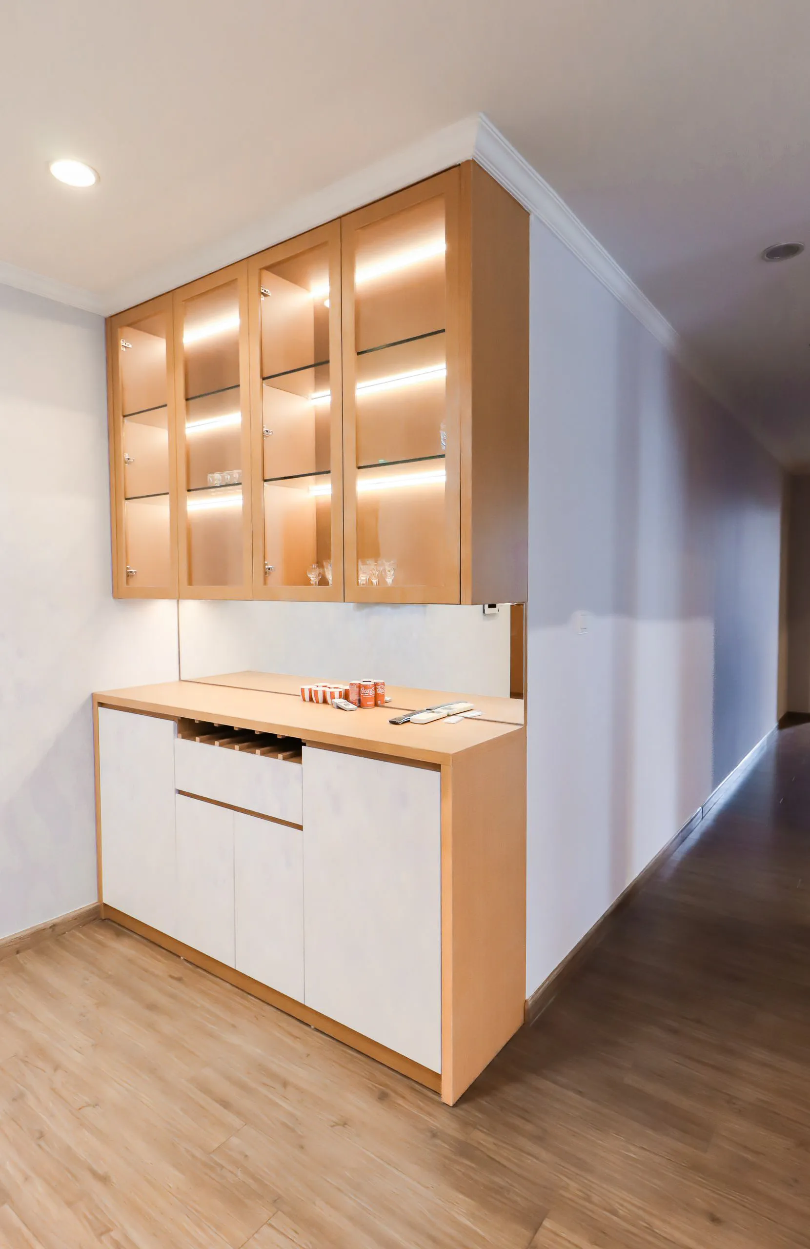 Custom walk-in closet built-ins with floor-to-ceiling hanging towers and drawer banks by IonBuilds in Plano, TX